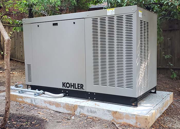 Large KOHLER generator outside